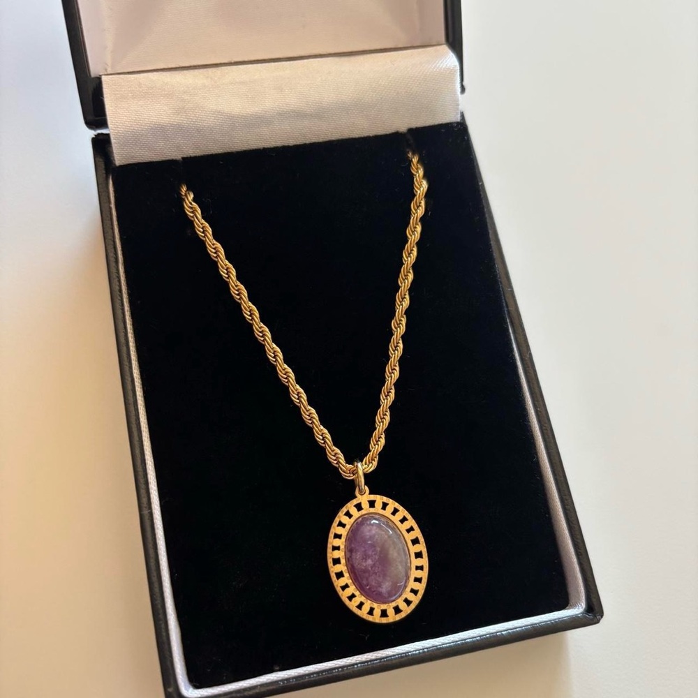 Gold necklace with purple amethyst stone